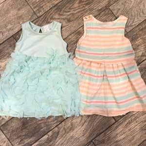 2 dresses size 2T and 24 months